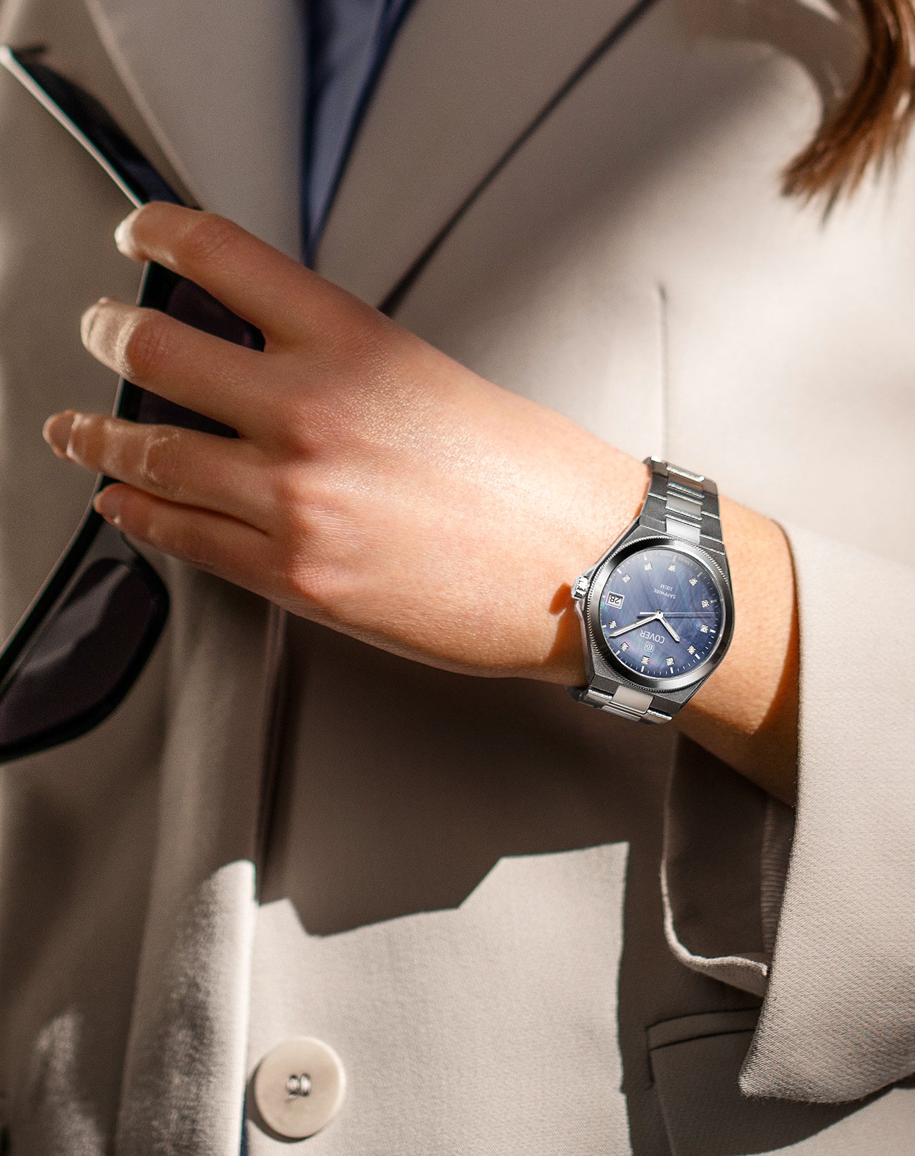 COVER Iconosteel Lady Blue Pearl Silver Watch on wrist with blue mother-of-pearl dial and silver stainless steel bracelet